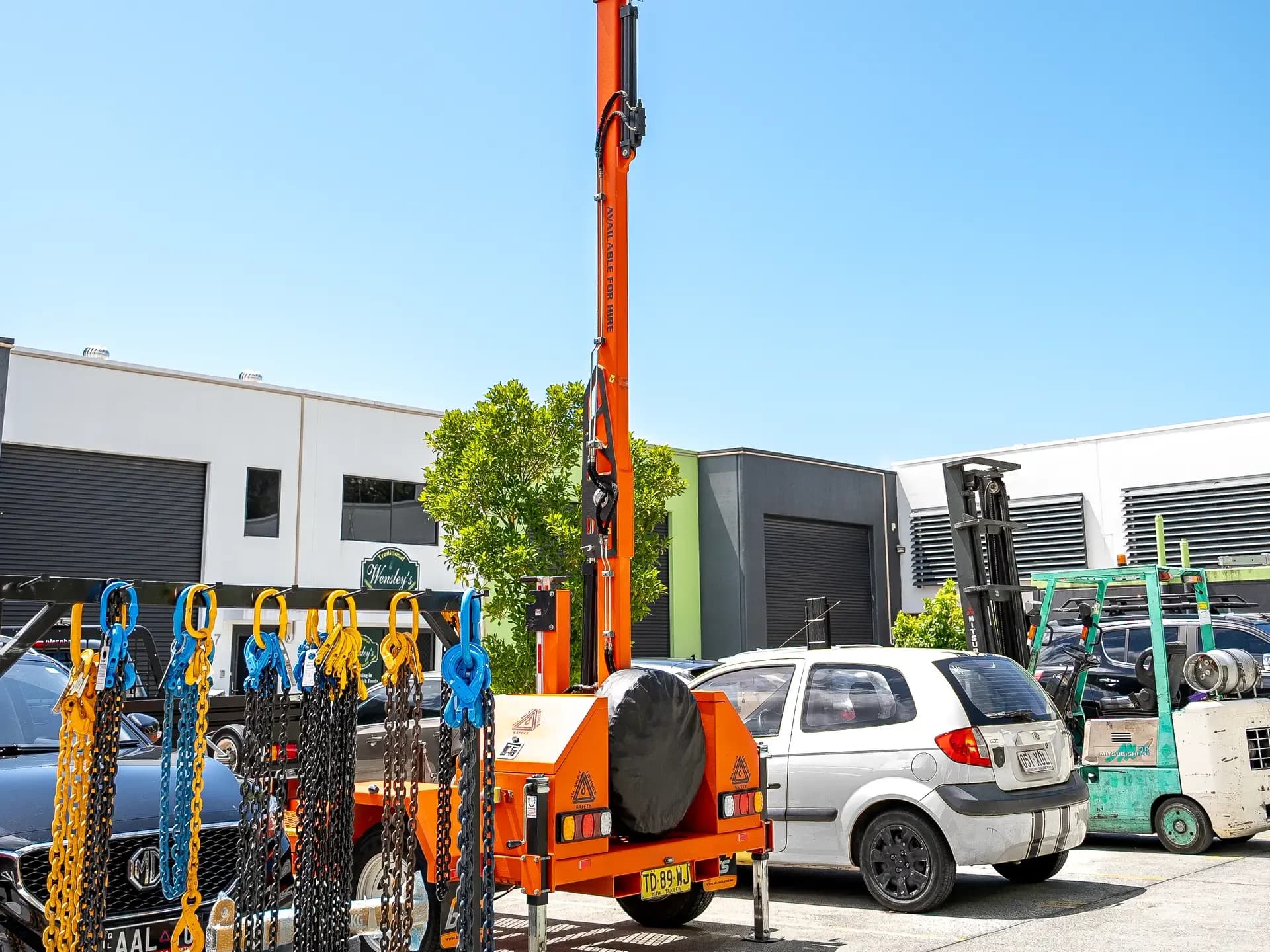 All About Lifting & Safety trailer-mounted davit crane and tagged chain slings in the Gold Coast yard