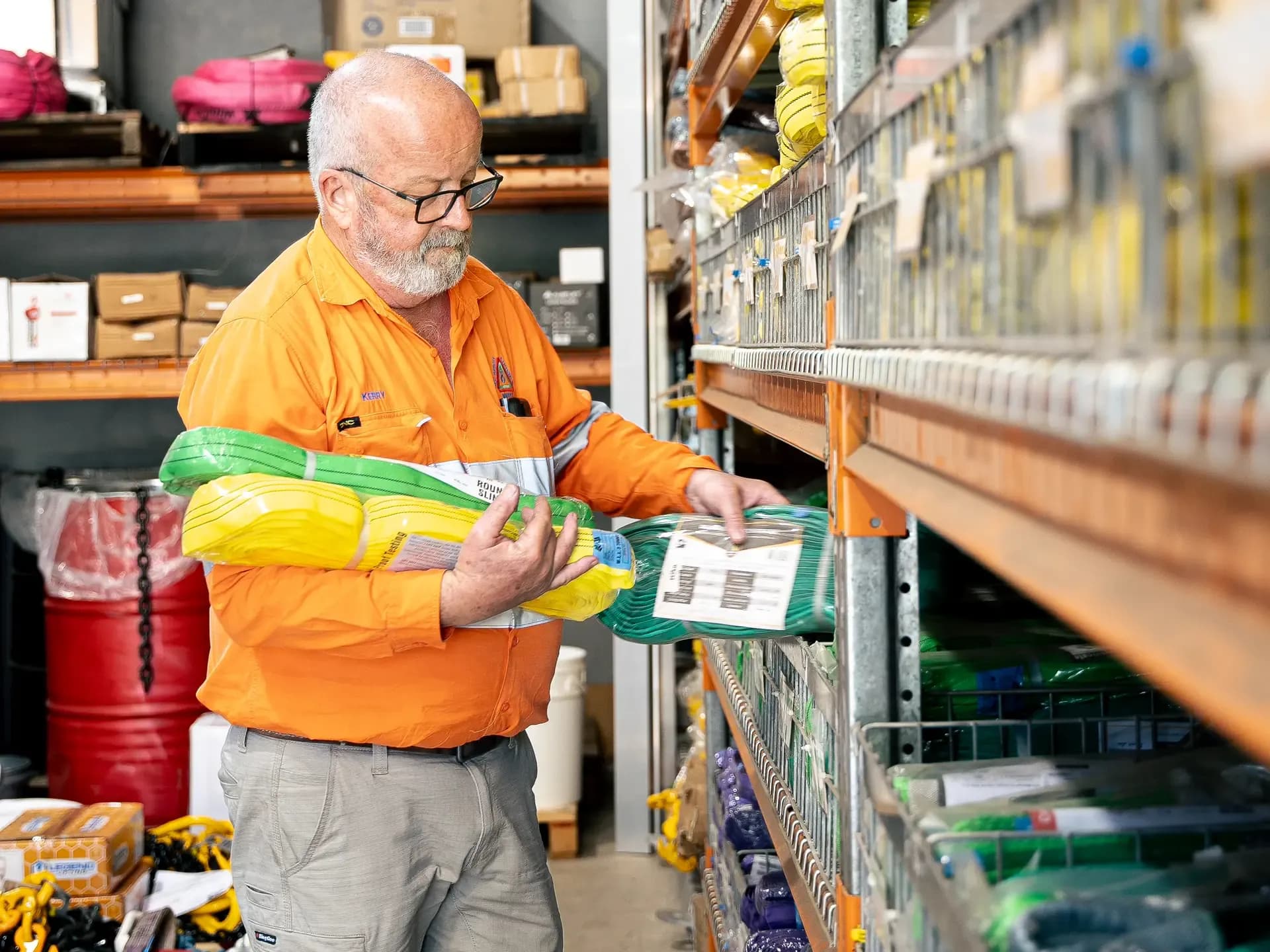 Sunshine Coast team member picking a round sling from the racking